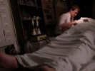 Dustin Sturgill as Victor Frankenstein works on body